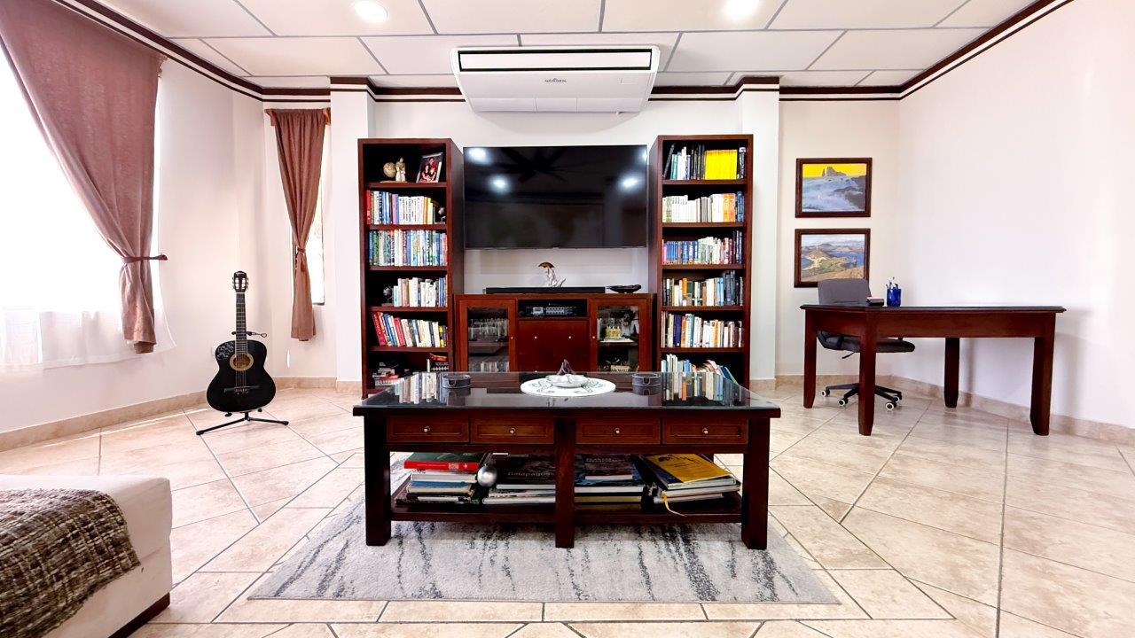 Casa Marina living area with flat-screen TV