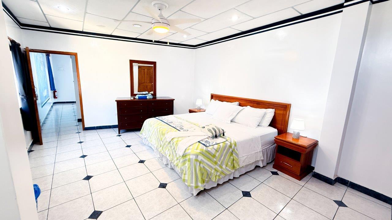 Light Blue White Bedroom Casa Marina with king bed